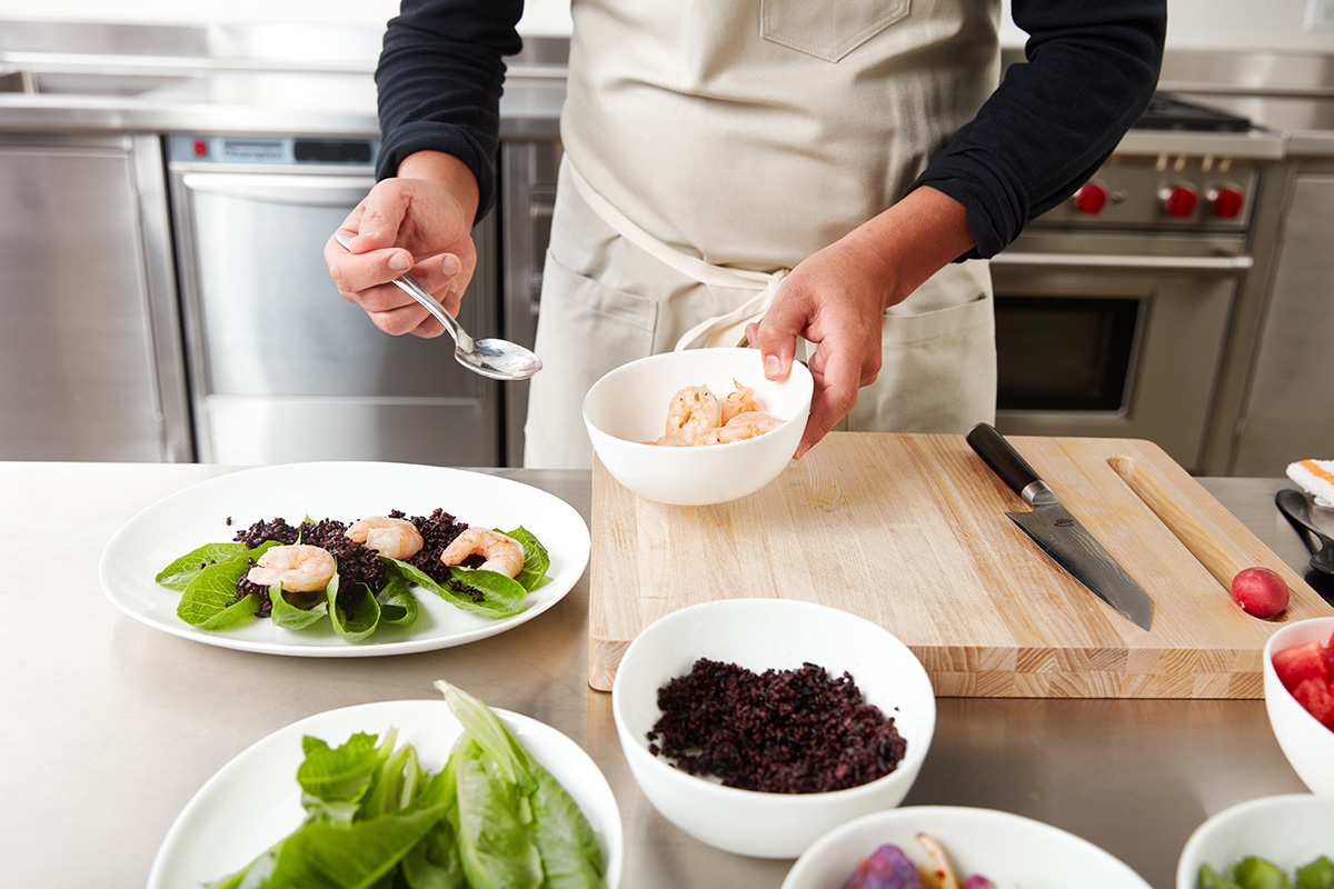 chef hands preparing shrimp
